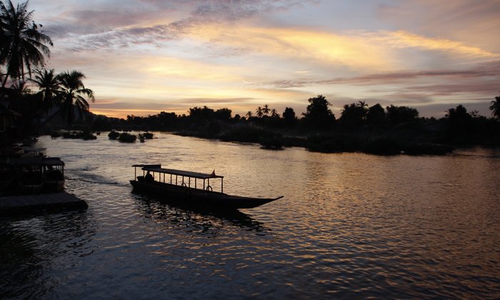 Der Mekong prägt die Region. Eine Bootsfahrt auf dem Fluss gehört zu Indochina Reisen dazu.