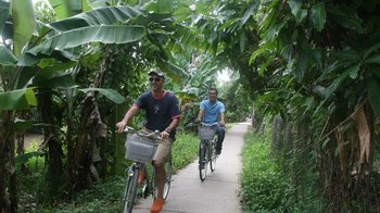 Fahrradtour im Mekongdelta einer der Ausflüge bei einer Kreuzfahrt durch das Delta